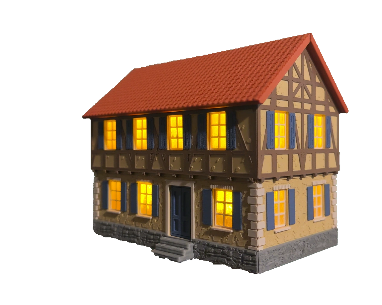 Selbst gedrucktes Hausmodell: beleuchtetes Fachwerk-Gasthaus mit blauen Fensterläden und Eingangsstufen