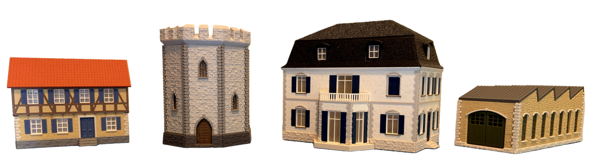 Vier echte gedruckte PrintHaus-Modelle: Fachwerkhaus, Wehrturm, Villa und Industriehalle